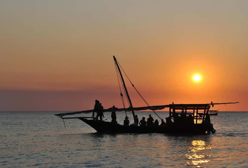 Traditional dhow at sunset on the Zanzibar coast